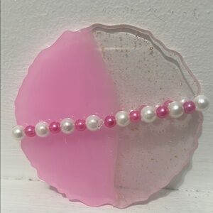 Pink and white pearled bracelet
